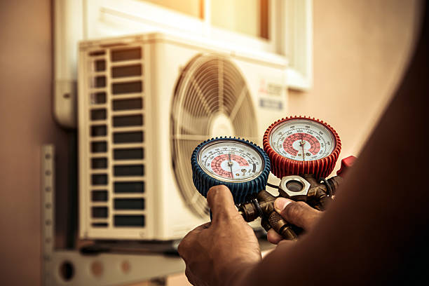 Professional Hvac technician working in Holden, MA
